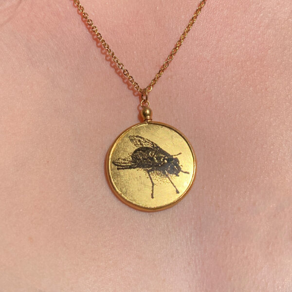 pendentif dead or alive verso
